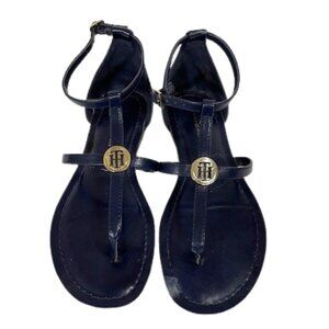Tommy Hilfiger navy flat ankle strap sandals.